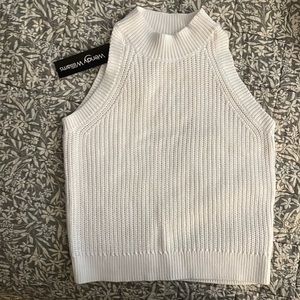 White, cotton, sleeveless sweater.